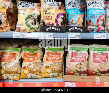 Asda own brand Granola breakfast cereal and Jordan`s Granola in Asda supermarket. UK Stock Photo